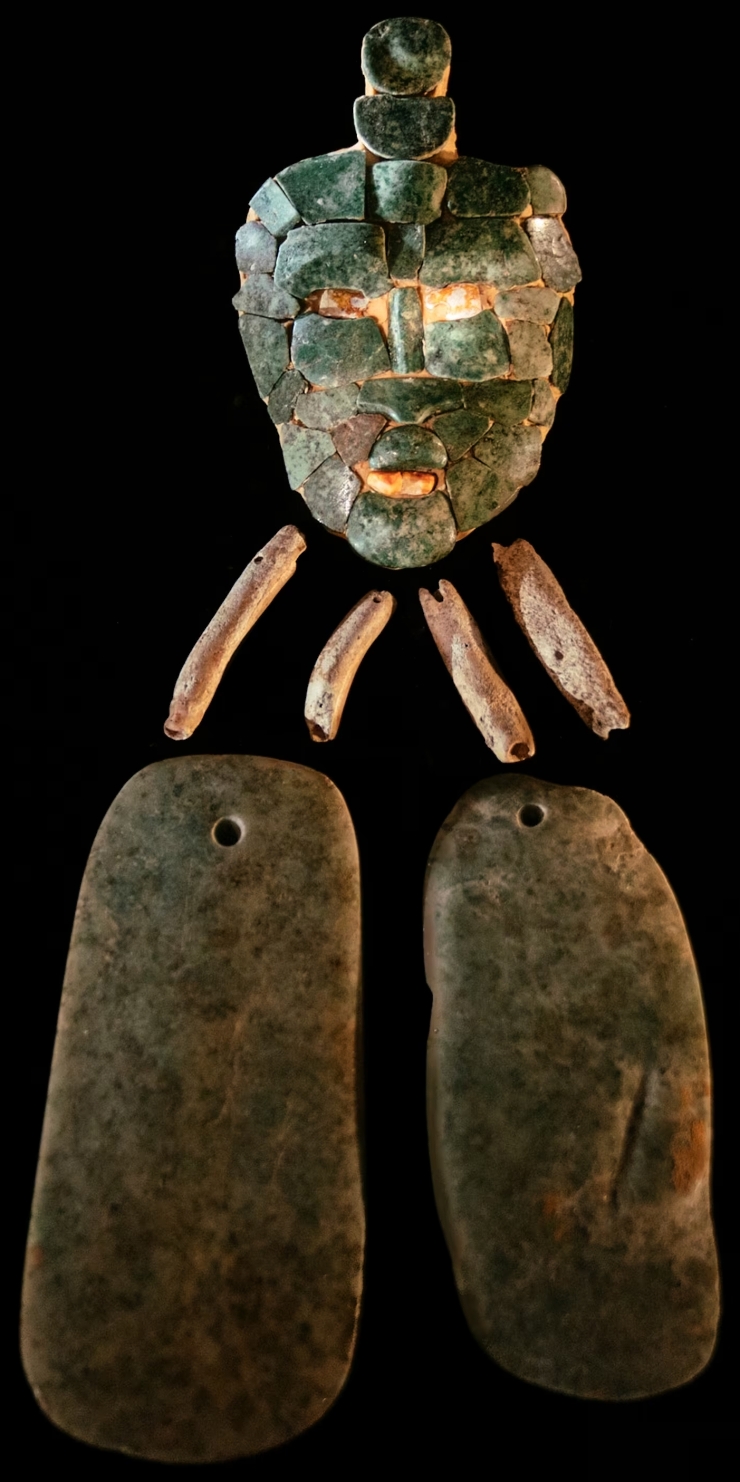 In a 1,700-year-old Mayan royal tomb, a jade mask of the god